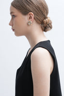 Aidan & Ice Sand Cascade Earrings featuring layered, sandy-toned earrings with a cascading design, hanging elegantly.