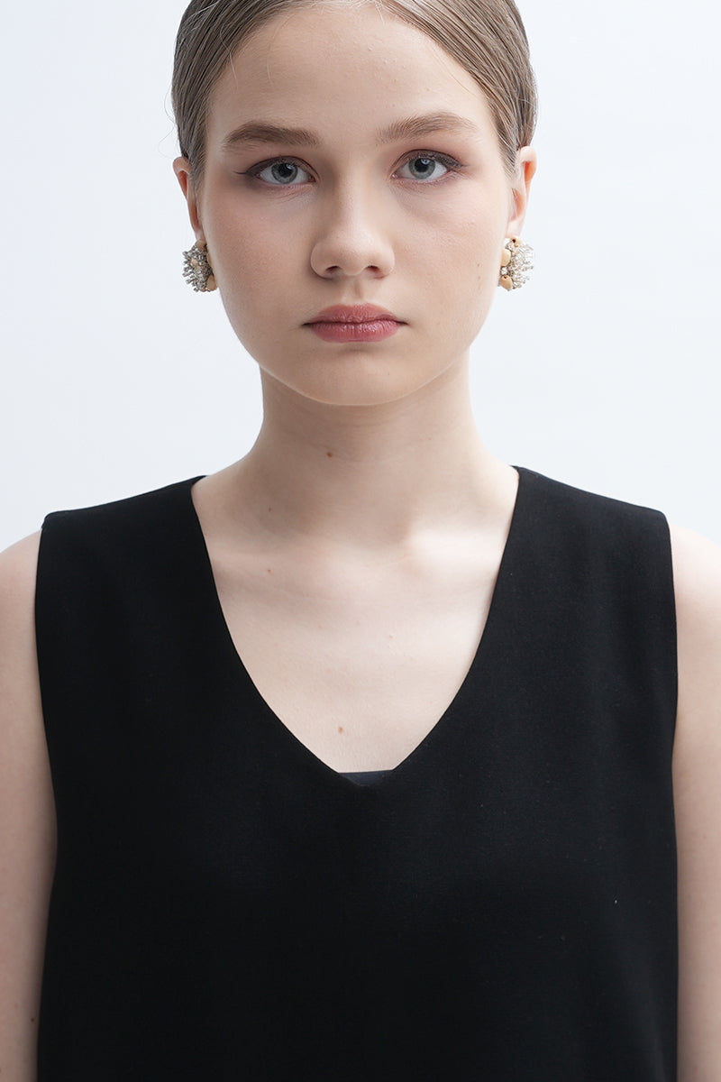 Aidan & Ice Sand Cascade Earrings featuring layered gold-toned chains and sand-colored beads on silver hooks.