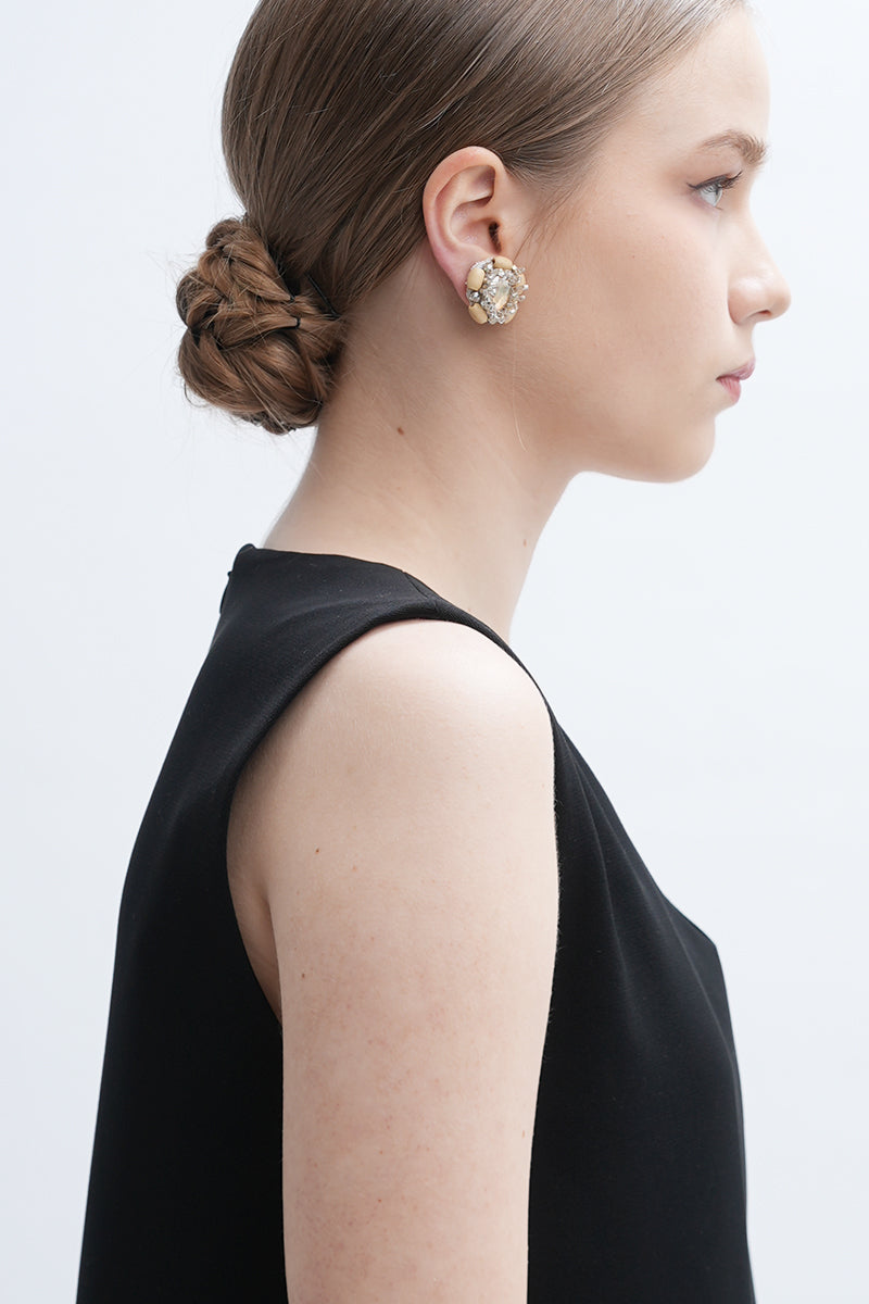 Aidan & Ice Sand Cascade Earrings featuring layered sandy-colored beads and silver hooks, elegant dangle jewelry for women.