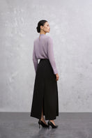 Black Nara midi skirt by EEGEN STUDIO featuring a sleek, flowing design perfect for stylish everyday wear.