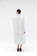 Studio NK ETHERAL Blazer in Ivory, tailored blazer with a sleek fit and elegant design, shown on a model.