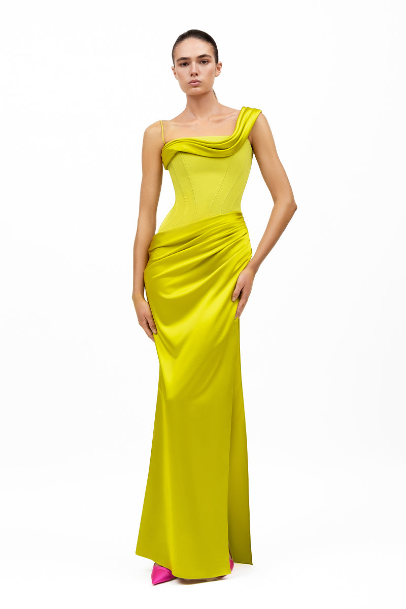 Pistachio ÈTOILE gown by MOON / HAKAAN YILDIRIM, featuring elegant fabric and flowing design.
