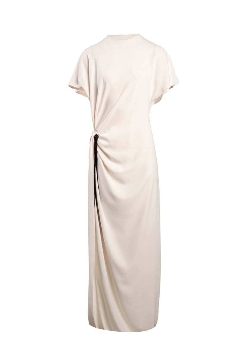 YASSMIN SALEH ivory maxi dress with a flowing design and ghostly front detail, perfect for elegant occasions.