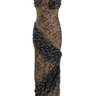 Black Echo gown by Yassmin Saleh featuring a ghostly front design, elegant and flowing for formal or casual wear.