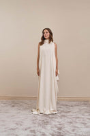 Ivory Eclipse Gown maxi dress by YASSMIN SALEH featuring a flowing silhouette and elegant design, front view image.