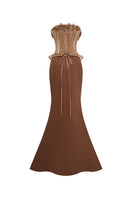 EEGEN STUDIO Sahara set gowns displayed, featuring elegant fabric and intricate design details in a well-lit setting.