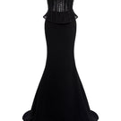 Elegant EEGEN STUDIO Reema gown with intricate embroidery and flowing fabric, perfect for special occasions.