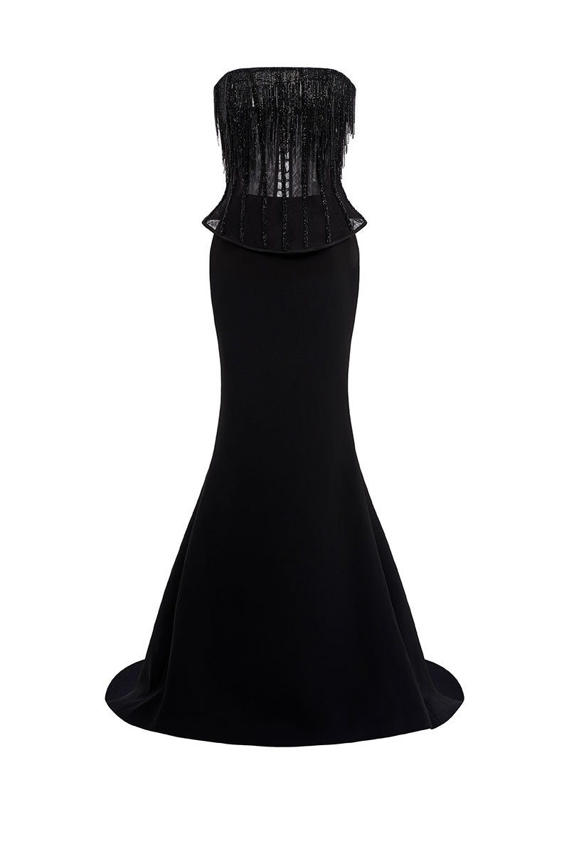 Elegant EEGEN STUDIO Reema gown with intricate embroidery and flowing fabric, perfect for special occasions.