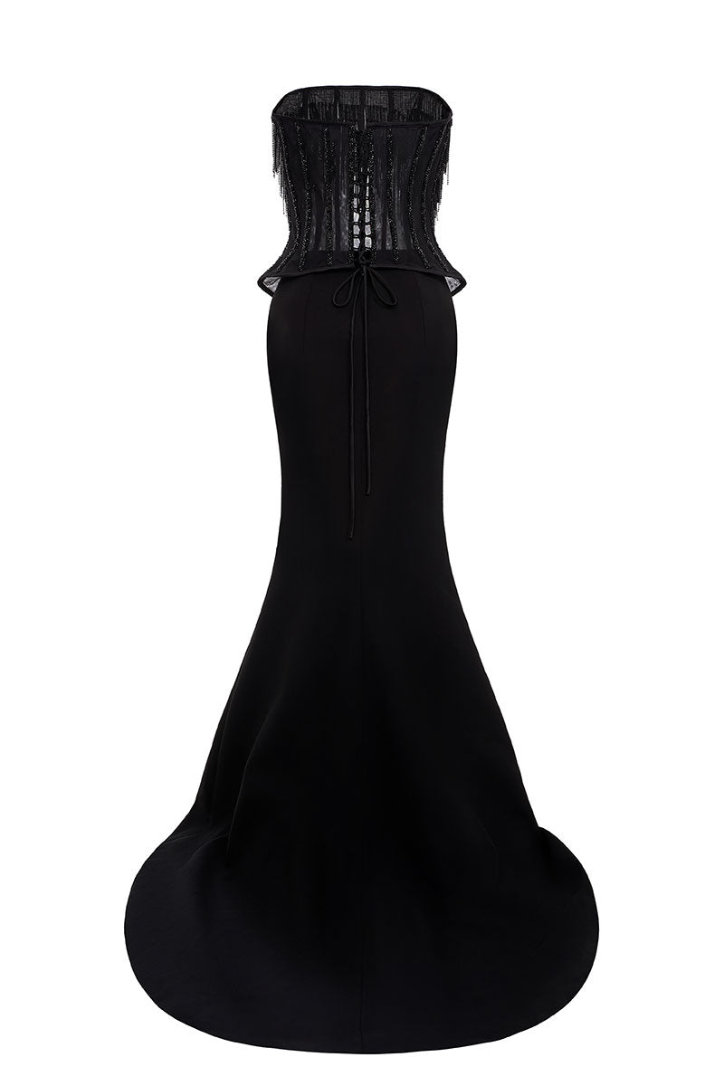 Elegant Reema gown by EEGEN STUDIO featuring intricate embroidery and flowing fabric, showcased in a full-length view.