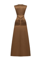Elegant AIRA gown by EEGEN STUDIO featuring flowing fabric and intricate detailing, perfect for formal occasions.