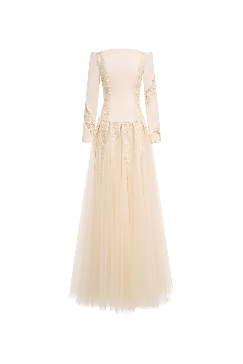 Elegant ELIRA gown by EEGEN STUDIO, featuring flowing fabric and intricate details, perfect for formal occasions.