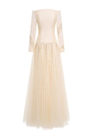 Elegant ELIRA gown by EEGEN STUDIO, featuring flowing fabric and intricate details, perfect for formal occasions.