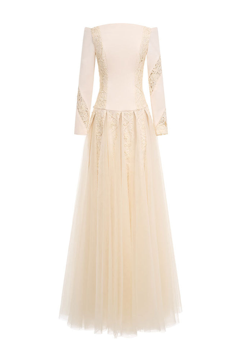 Elegant ELIRA gown by EEGEN STUDIO, featuring flowing fabric and intricate details, perfect for formal occasions.