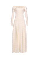 White ELOWEN maxi dress by EEGEN STUDIO, flowing fabric and elegant design, displayed on a hanger.