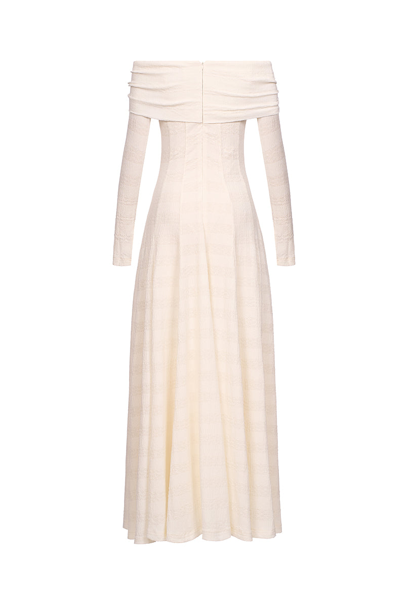 White ELOWEN maxi dress by EEGEN STUDIO, flowing fabric and elegant design, shown on a model.