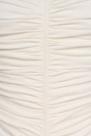 Eegen Studio Lunaria Maxi Dress in flowing fabric with floral print, displayed on a hanger against a neutral background.