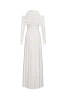 Eegen Studio Lunaria Maxi Dress in flowing fabric with floral print, featuring a fitted bodice and long, elegant skirt.