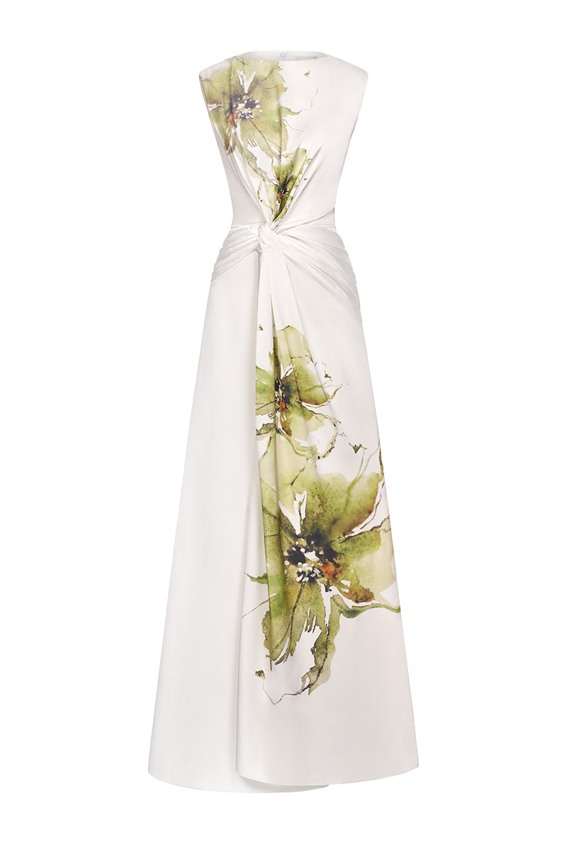Eegen Studio Florea maxi dress in flowing fabric with a floral pattern and relaxed fit, displayed on a hanger against a neutral background.