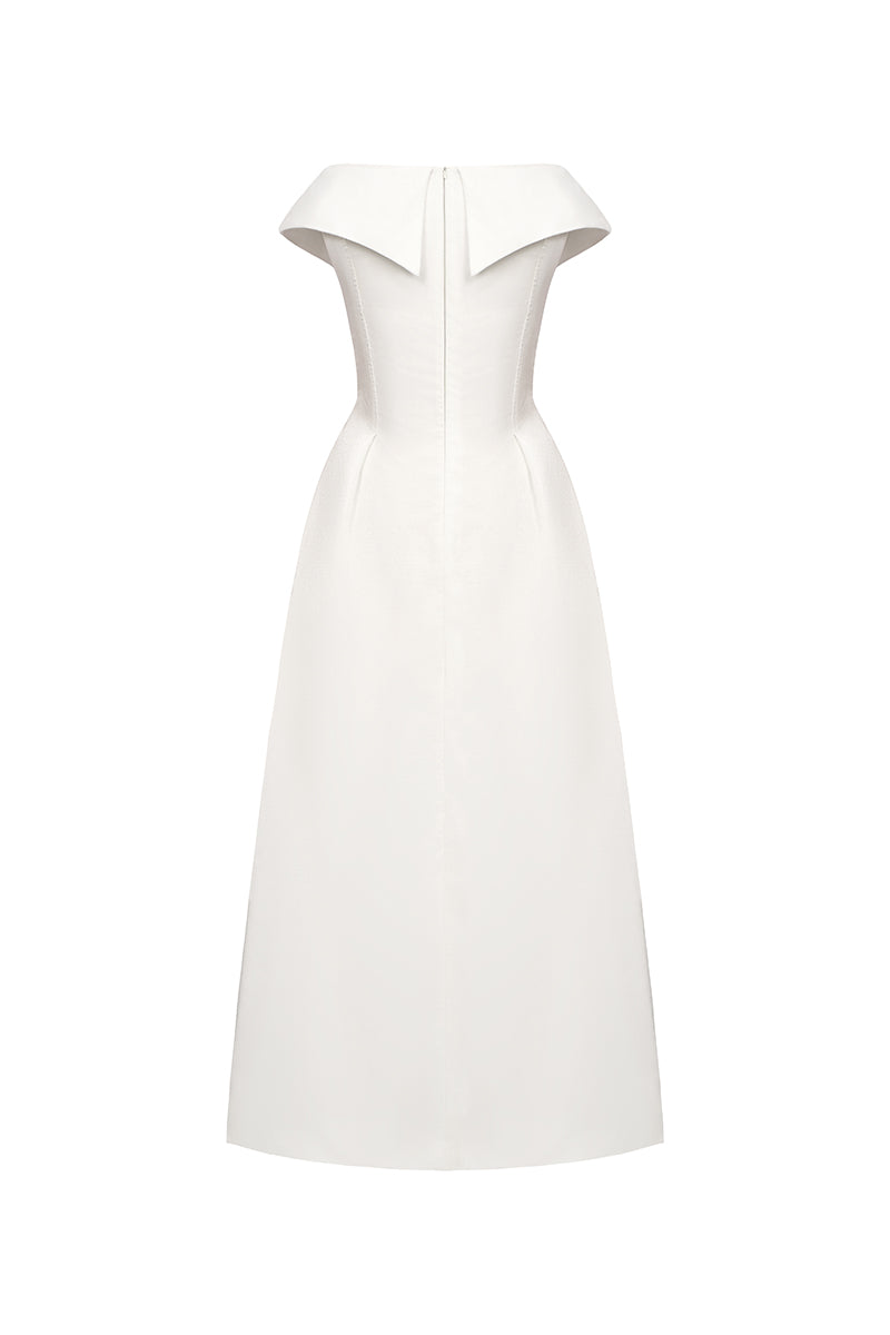 Light blue LILIA Maxi Dress by EEGEN STUDIO displayed on a hanger, featuring flowing fabric and elegant design.