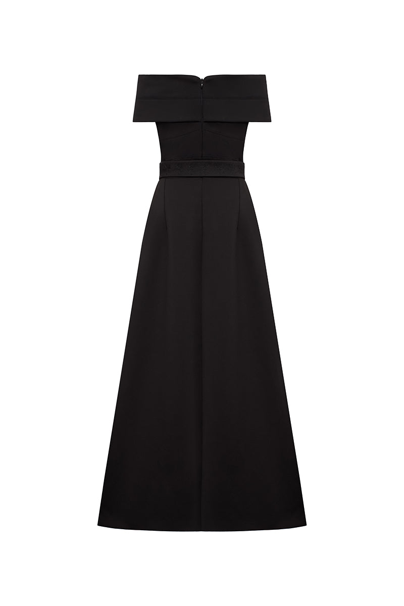 Eegen Studio Clara maxi dress featuring a flowing silhouette and elegant design, shown in a vibrant fabric.