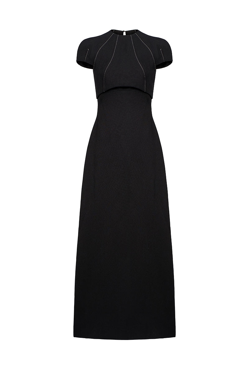 Elegant navy blue LYRA Maxi Dress by EEGEN STUDIO displayed on a hanger against a neutral background.