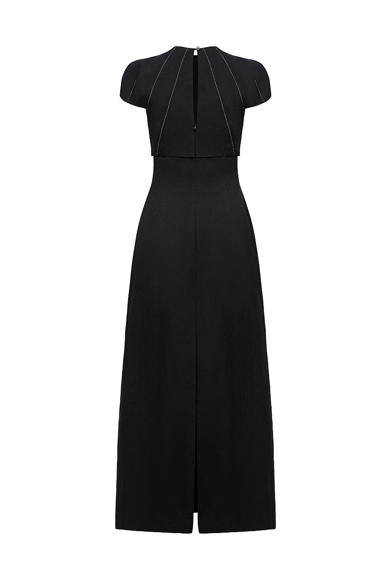 Elegant EEGEN STUDIO Lyra Maxi Dress featuring flowing fabric and a stylish silhouette, perfect for summer or special occasions.
