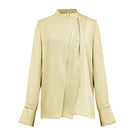 Light yellow EEGEN STUDIO NARA long sleeve top with a relaxed fit, shown on a model with a simple background.