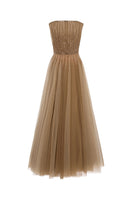 Elegant Noura gown by EeGen Studio featuring intricate embroidery and flowing fabric, perfect for formal occasions.