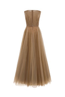 Elegant Noura gown by EEGEN STUDIO featuring flowing fabric and intricate detailing, perfect for formal occasions.
