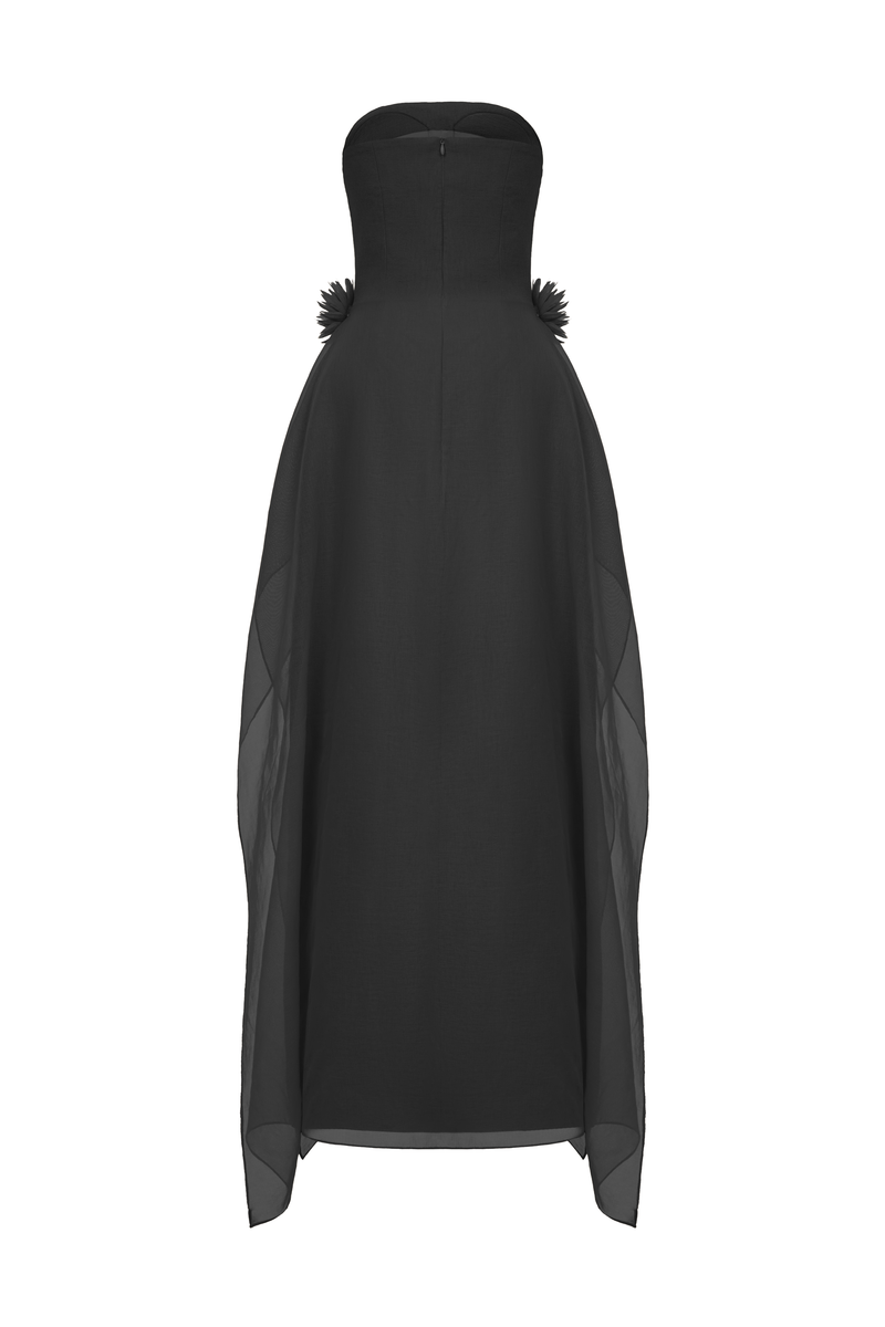Elegant EEGEN STUDIO shale gown with flowing fabric and intricate detailing, perfect for formal occasions.