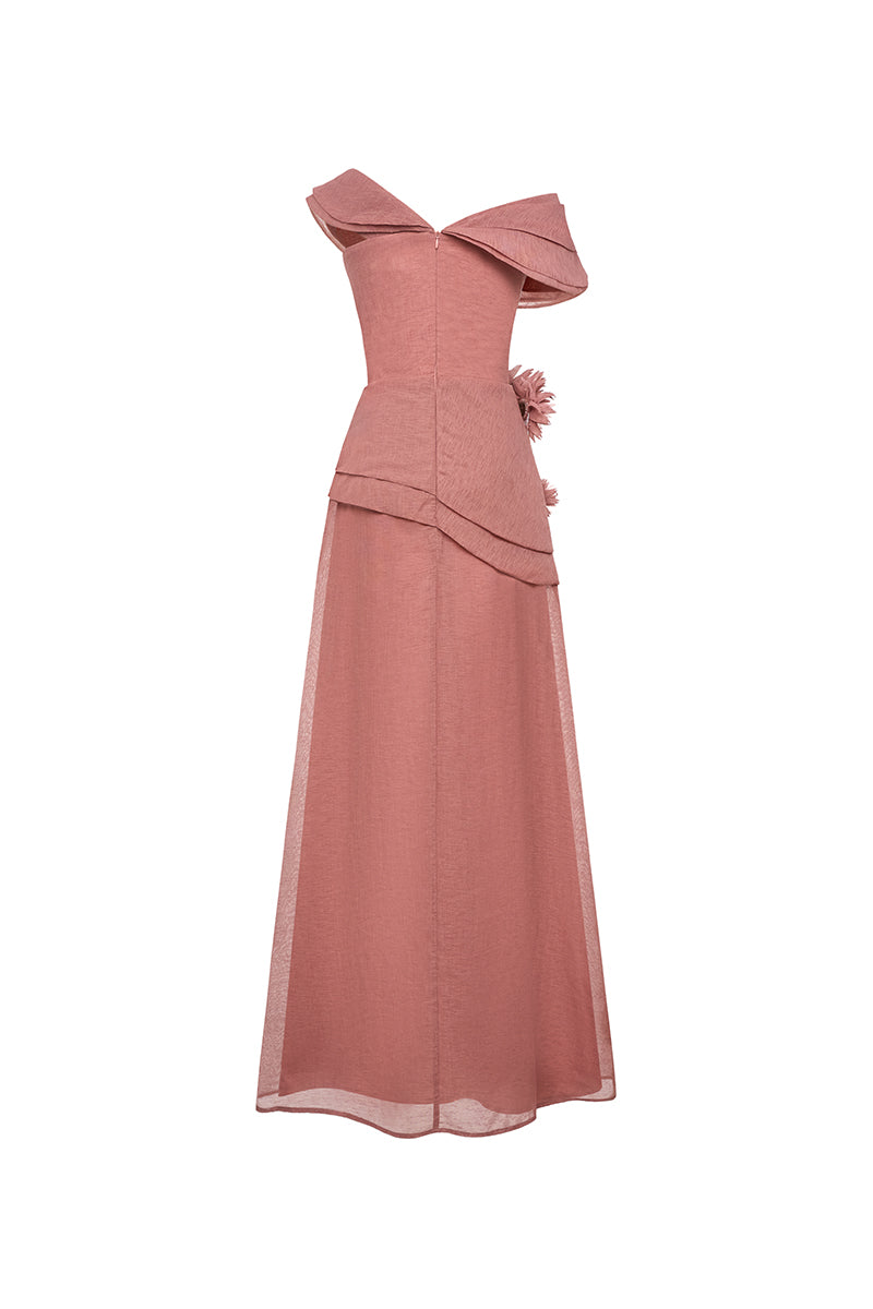 Elegant navy blue Cyra gown by EeGen Studio featuring flowing fabric and a stylish design, perfect for formal occasions.