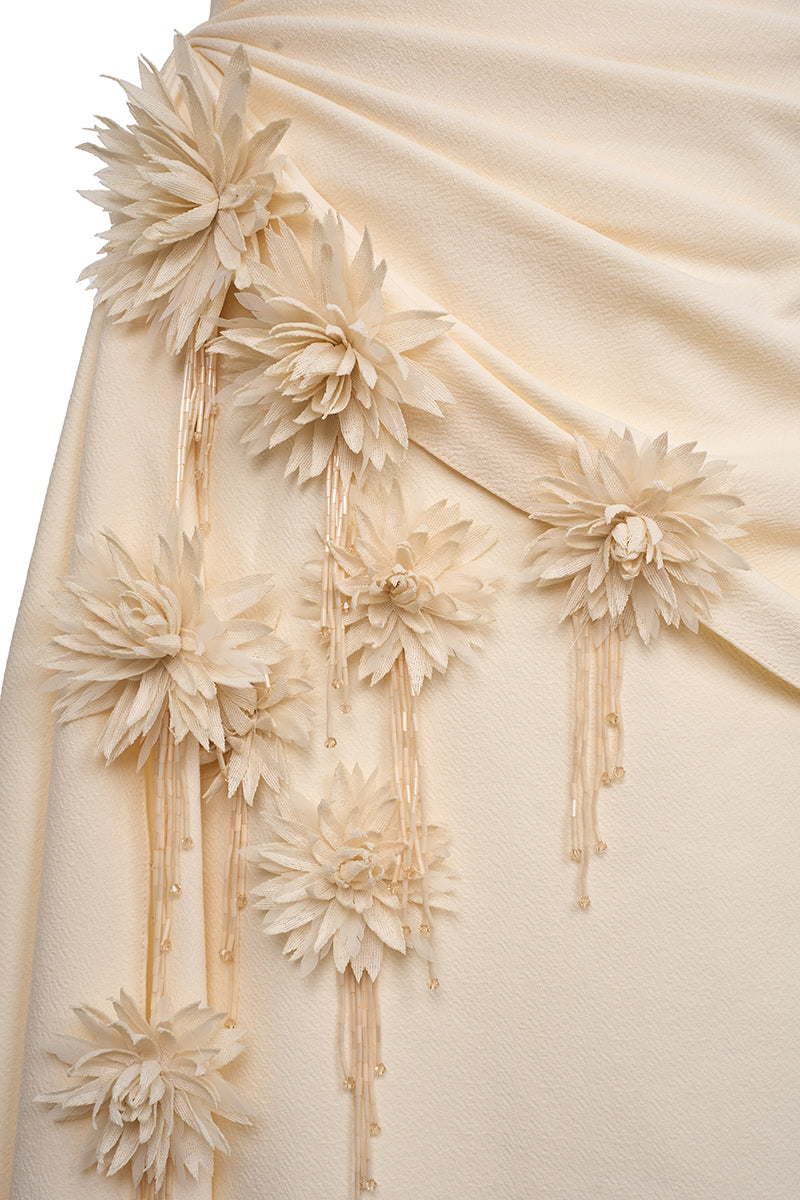 Elegant Amira gown by EEGEN STUDIO featuring intricate embroidery and flowing fabric, perfect for formal occasions.