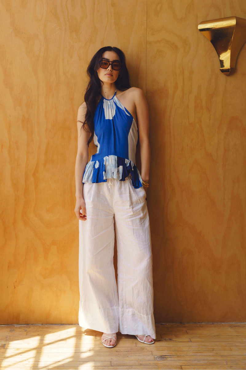 Light beige Elara top from Summer Away featuring a relaxed fit and soft fabric, ideal for casual summer wear.