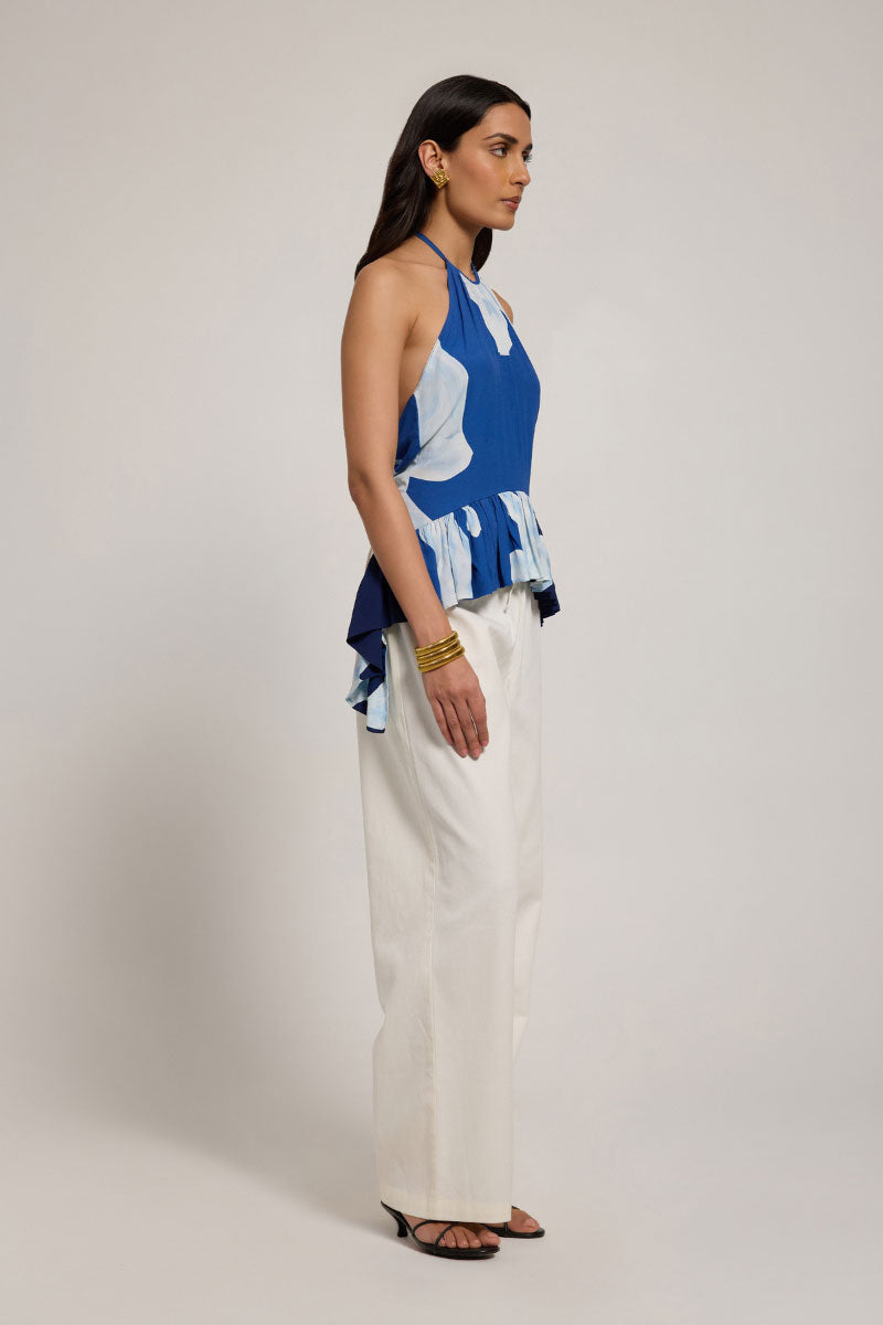 Light beige Elara top from Summer Away, featuring a relaxed fit and textured fabric, perfect for casual summer wear.