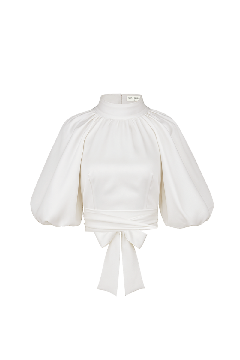 Ivory Elara crop top by ANA + MARIA displayed on a mannequin, showcasing a stylish, fitted tops design with a soft, smooth fabric.