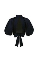 Navy blue Elara crop top by ANA + MARIA displayed on a mannequin, showcasing its fitted style and soft fabric.