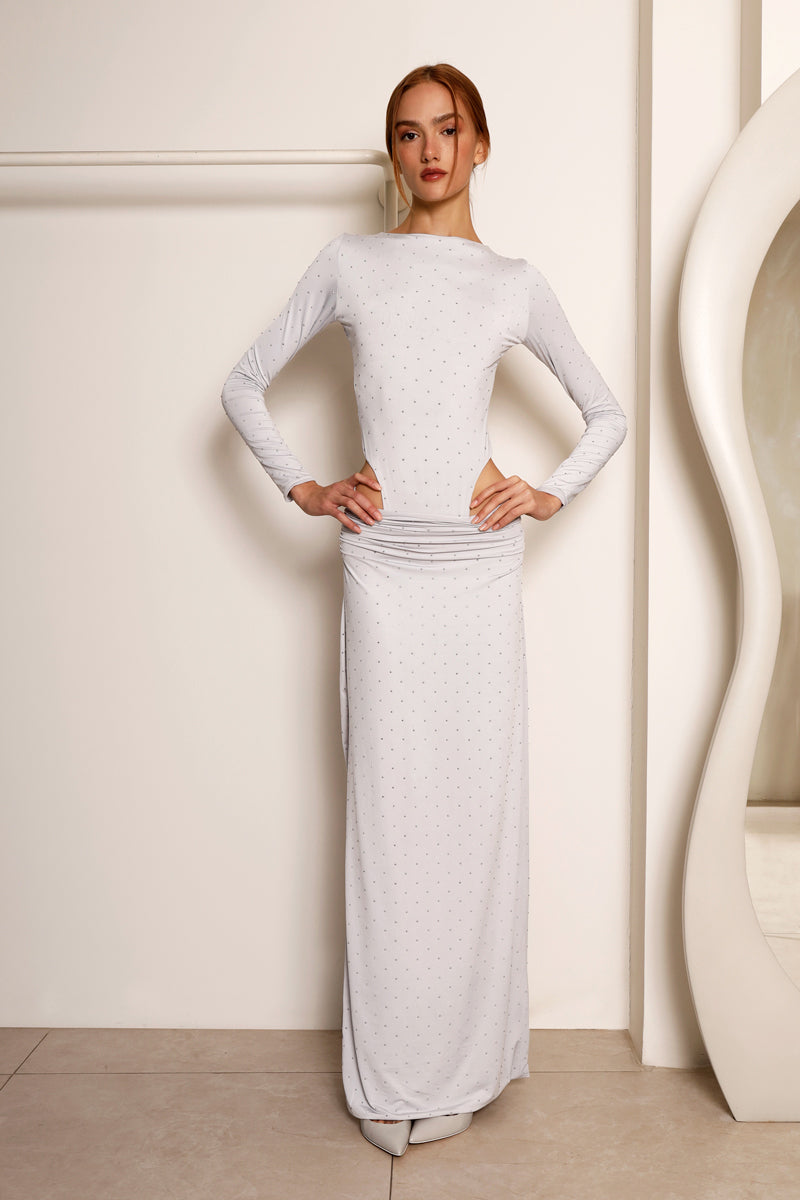 Silver metallic co-ord set from Rayane Bacha featuring a fitted top and matching wide-leg pants, stylish and modern.