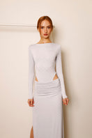 Rayane Bacha Elara metallic silver co-ord set featuring a fitted top and matching high-waisted pants.