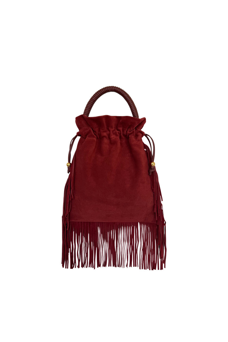ISIDORA MALVA Elena suede top handle bag with burgundy fringes and gold accents, stylish accessory for everyday or evening use.