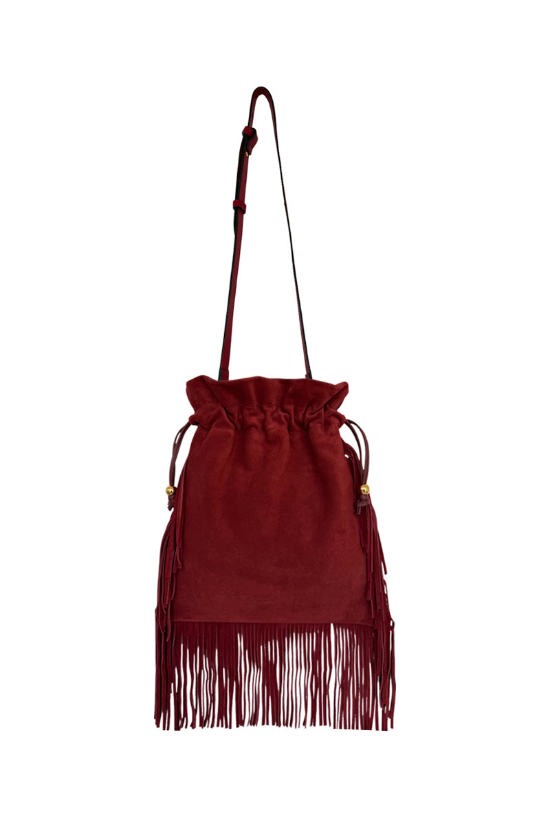 ISIDORA MALVA Elena suede top handle bag with fringes in burgundy, showcasing its stylish design and textured suede material.