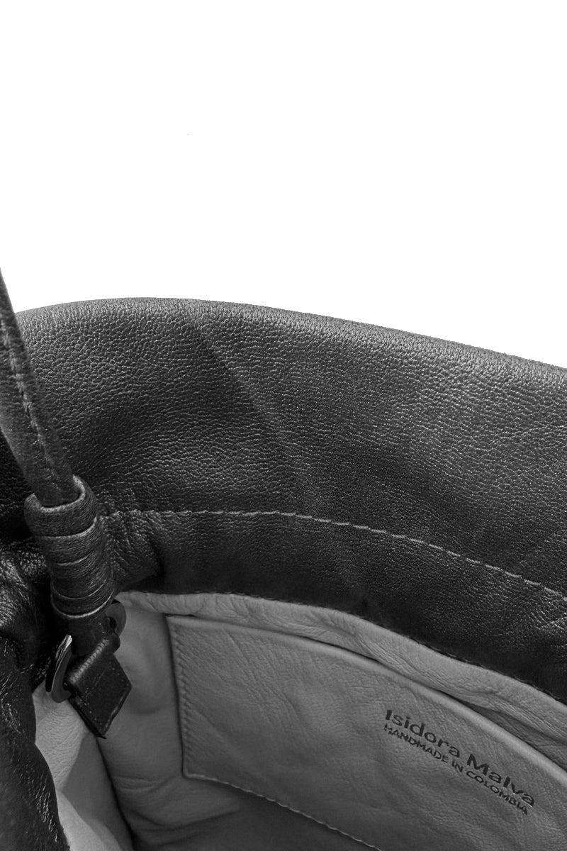 Black ISIDORA MALVA Elena Mini Pouch shoulder bag with sleek, compact design and adjustable strap.