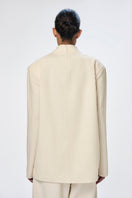 White silk Eli Top by URA, stylish and elegant women's top featuring smooth fabric and a modern design.