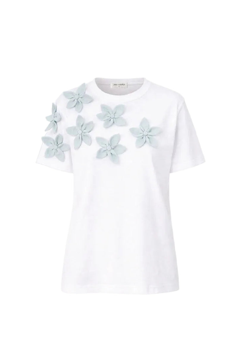 Light blue ELIA T-shirt from ANA + MARIA, casual top with a ghost-themed graphic design, displayed on a plain background.