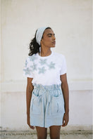Light blue Ana + Maria Elia T-shirt, a casual tops product with a comfortable fit and simple design.