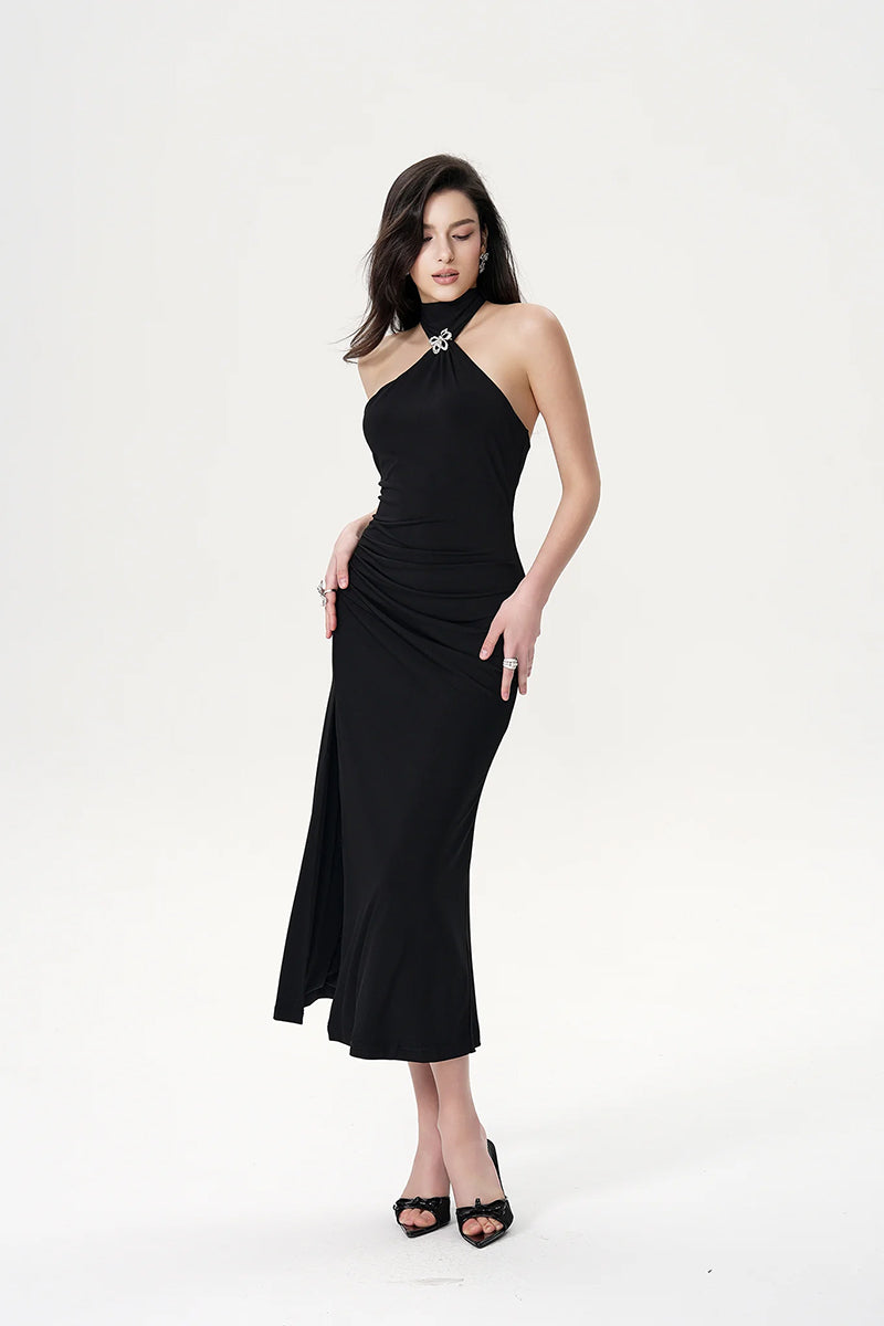 Black Eliana Dress by Nana Jacqueline, a stylish maxi dress featuring a flowing silhouette and elegant design.