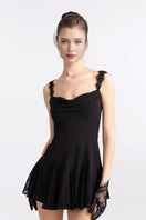 Black Elizabeth lace mini dress by Nana Jacqueline, close-up of intricate lace details and fitted silhouette.