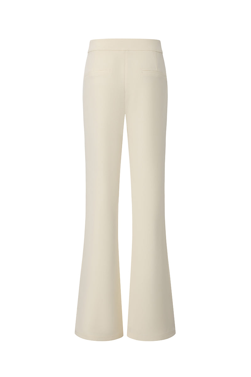 Back view of Nana Jacqueline Ella flared pants in champagne color, showcasing a stylish and flowing silhouette.
