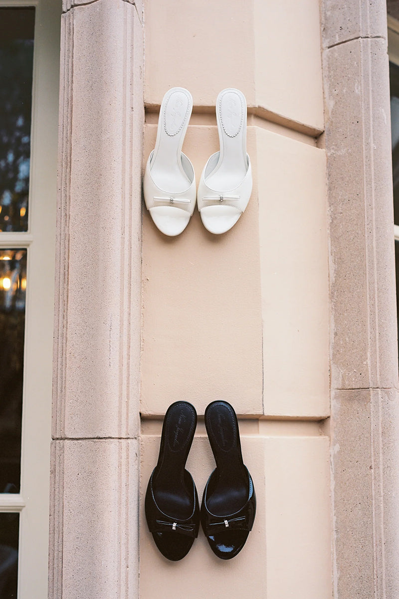 Nana Jacqueline Ella Heart black heels featuring a stylish heart-shaped design and elegant stiletto heel.