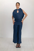 Dark blue Ellen bib top by ANA + MARIA featuring a stylish, fitted design with a rounded neckline and short sleeves.
