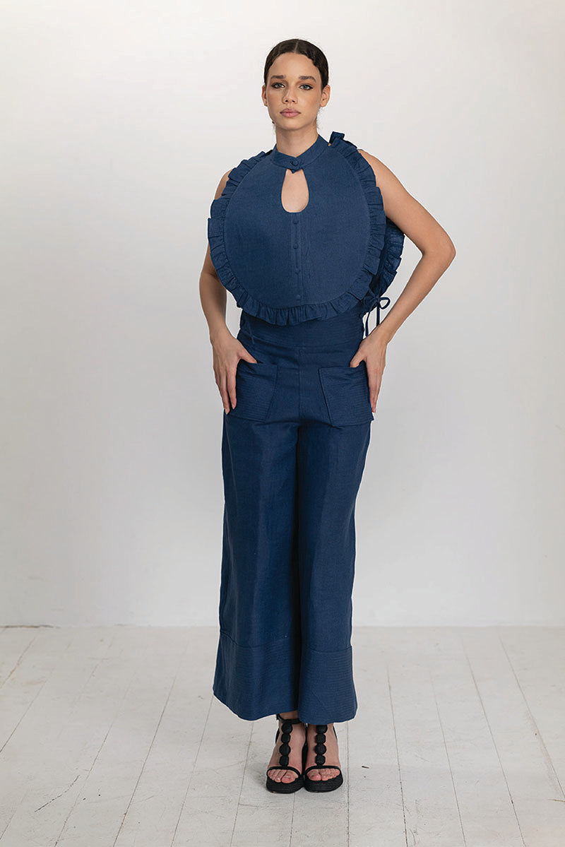 Dark blue Ellen bib top by ANA + MARIA featuring a stylish, fitted design with a rounded neckline and short sleeves.